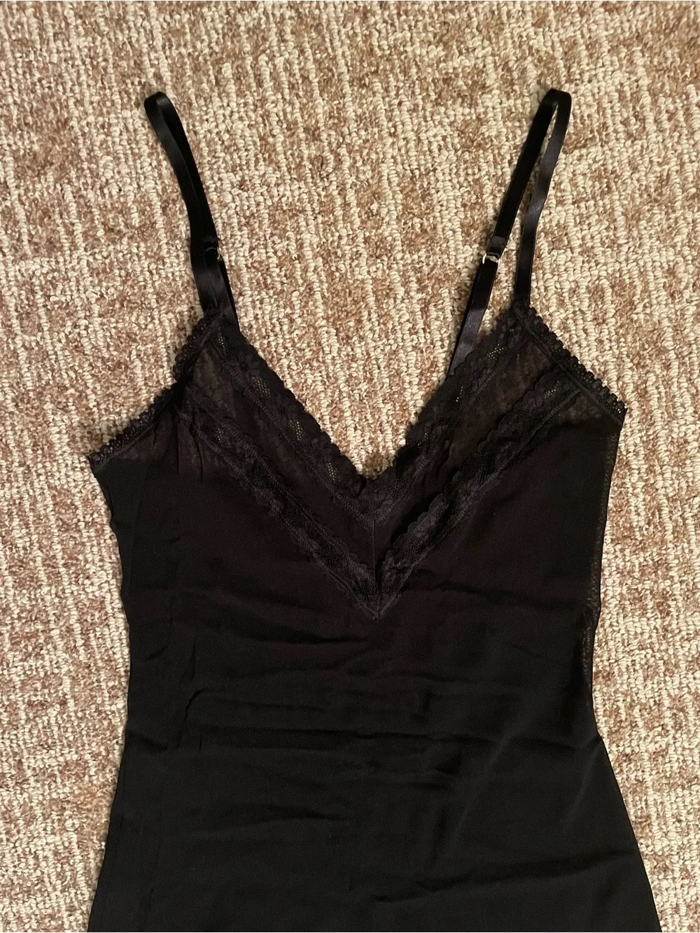 Sheer black negligeé with lace trim